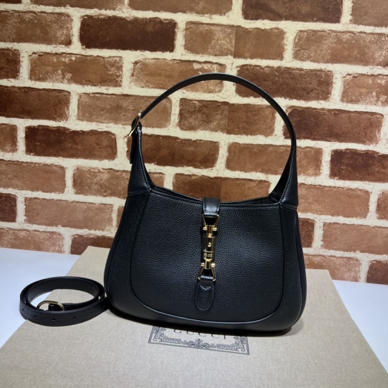 G*u*i top handle bags